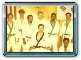 Master Henry center after testing Master Richard Morales 3rd from left Charlie Wedemeyer far right standing 1968